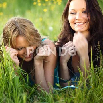 Women grass fun Stock Photos