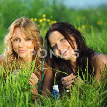 Women grass fun Stock Photos