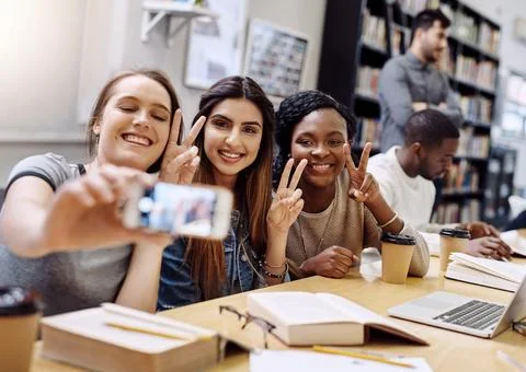 Women group, selfie and college library with smile, happiness and diversity for Stock Photos