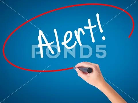 Women Hand writing Alert! with black marker on visual screen Stock Photos