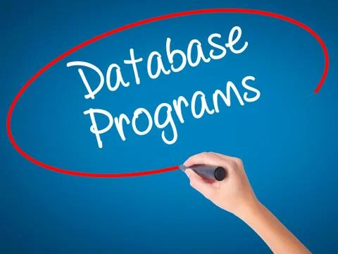 Women Hand writing Database Programs with black marker on visual screen. Foto stock