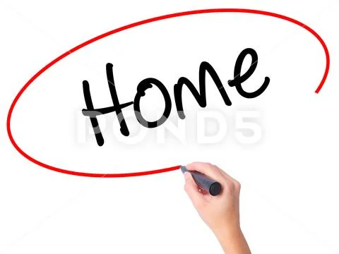 Women Hand writing Home with black marker on visual screen Stock Photos