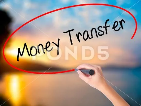 Women Hand writing Money Transfer with black marker on visual s Stock Photos
