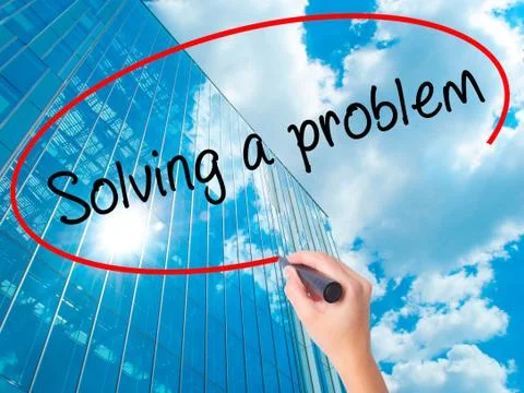 Women Hand writing Solving a problem with black marker on visual screen Foto stock