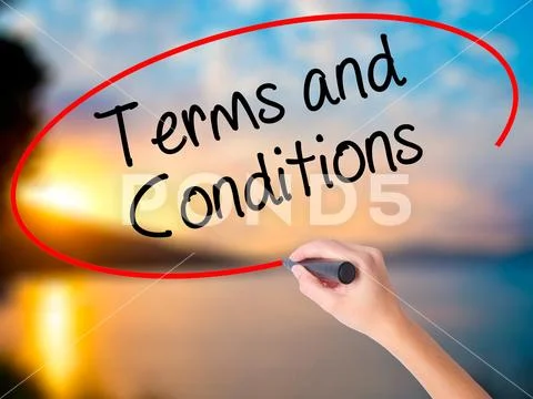 Women Hand writing Terms and Conditions with black marker on vis Stock Photos