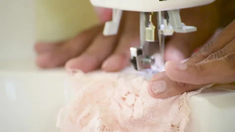 Women hands tailor sewing machine. Young fashion designer hands using sew machin Video stock 229676788