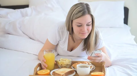Women having breakfast in the bed Stock Footage 59222891