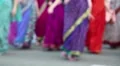 Women in Hindu traditional colorful costumes, dancing on the street HD Footage