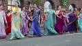 Women in Hindu traditional costumes, dancing and singing Hare Krishna mantra HD Footage