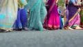 Women in Hindu traditional costumes, dancing and singing Hare Krishna mantra HD Footage
