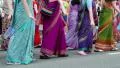 Women in Hindu traditional costumes, dancing and singing Hare Krishna mantra HD Footage