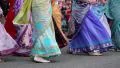 Women in Hindu traditional costumes, dancing and singing Hare Krishna mantra HD Footage