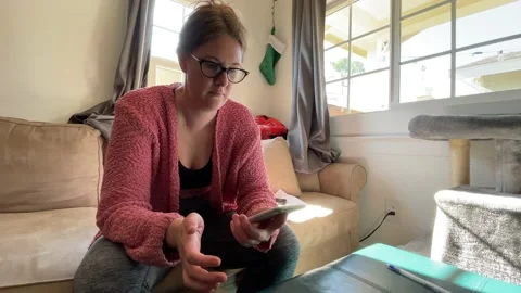 Women on iphone Undo shake. Video stock 168110374
