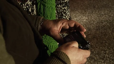 Women Looking at Compact Camera Screen. Close-Up.   Video stock 113071479