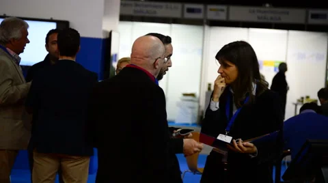 Women making a interview at a trade fair Stock Footage 48564774