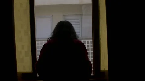 A women open a window Video stock 228803982