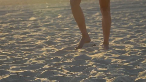 Women players play beach volleyball and a player jump serves serving the ball, s Stock Footage