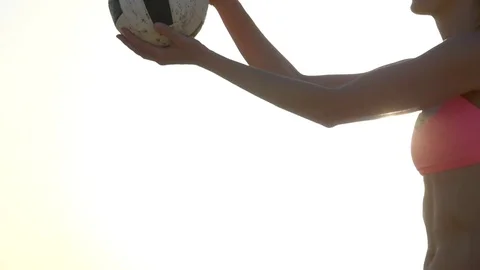 Women players play beach volleyball and a player serves the ball, super slow mot Stock Footage