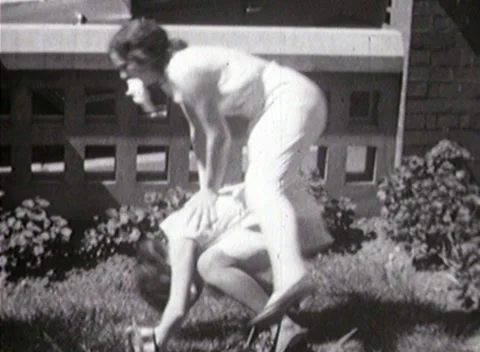 Women Playing Leapfrog etc in Backyard (1932)_ Stock-Footage 150556477
