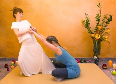 Women practicing physical exercise Stock Photos