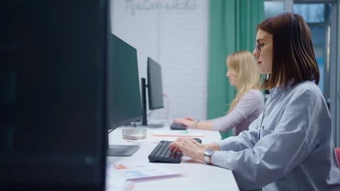 Women Programmers Working In Modern Office, Team Of IT Professionals And Web Video stock 274246664