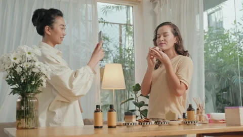 Women Recording Video Tutorial of How to Make Soap at Home Stock Footage 239340395