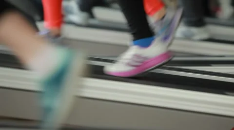 Women running on treadmill Stock Footage 62888889