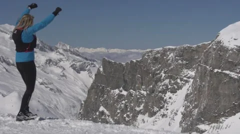 Women runs up high Snowy Mountain 스톡 동영상 59188758