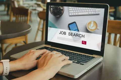 Women searching for a job using a computer Stock Photos