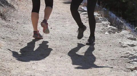 Women shadow jumping having fun Stock Footage 37624448