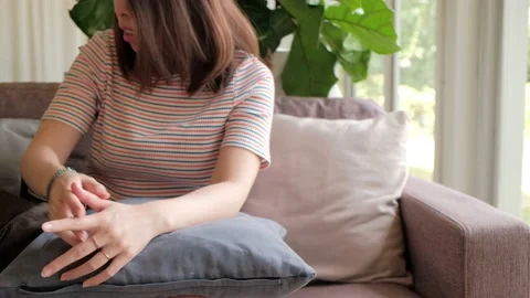 Women sitting on sofa and  using tablet computer for social network. Stock Footage 135347747