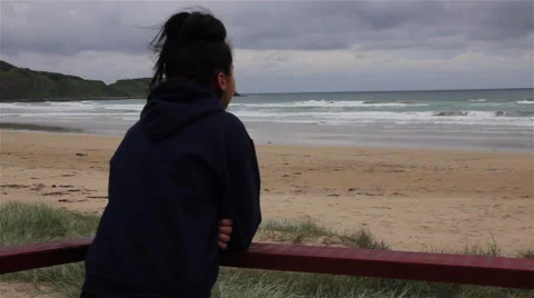 Women Staring at beach Stock Footage 65818226