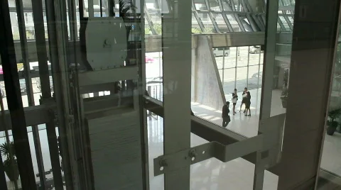Women in Suits Obscured by Elevator Stock Footage 664407