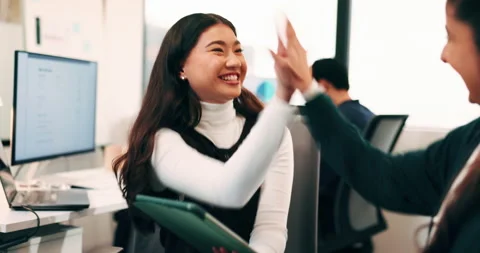 Women, tablet and high five with success at office, celebration or support for Stock Footage 336240844