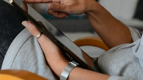 A women with a tablet 스톡 동영상 76149607