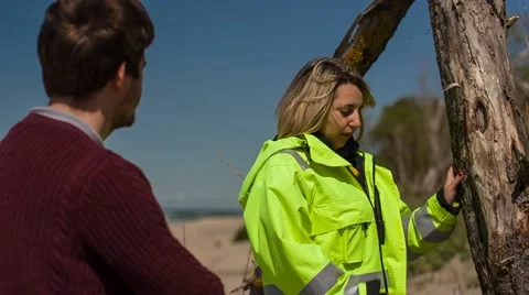 Women talking to a man on Conservancy Stock Footage 67448942