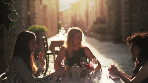 Women talking at the restaurant Stock Footage 25334161