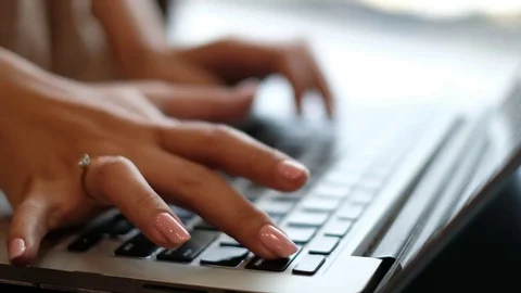 Women type on computer Stock Footage 75998444