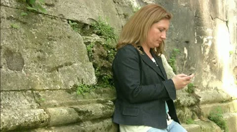 Women using cell phone Stock Footage 10892962
