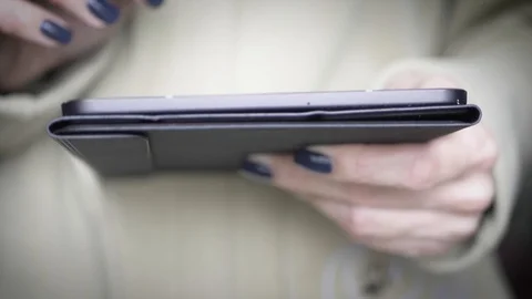 Women using her mobile tablet Stock Footage 97721552