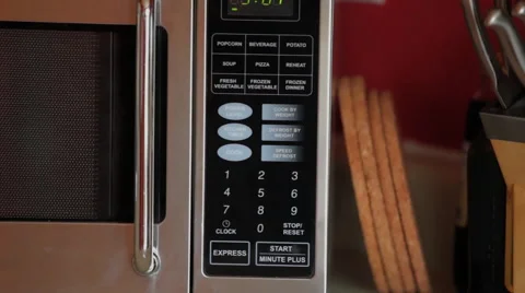 Women using microwave Stock Footage 46200905