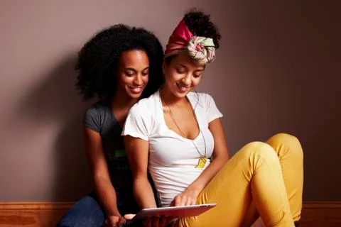 Women using tablet computer 写真素材