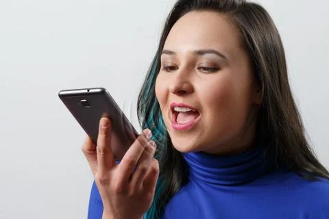 Women Using the voice recognition function, smart phones , Technology Stock Photos