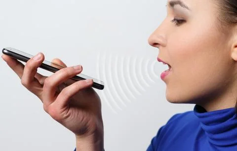 Women Using the voice recognition function, smart phones , Technology Stock Photos