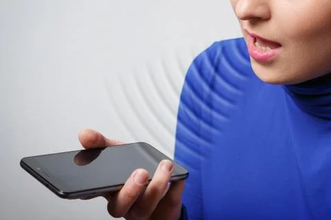 Women Using the voice recognition function, smart phones , Technology Foto stock