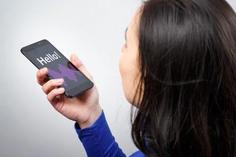 Women Using the voice recognition function, smart phones , Technology Stock Photos