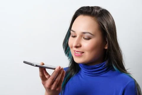 Women Using the voice recognition function, smart phones , Technology Stock Photos