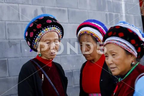 Women from various ethnic minorities of Yunnan with their traditional clothes Stock Photos