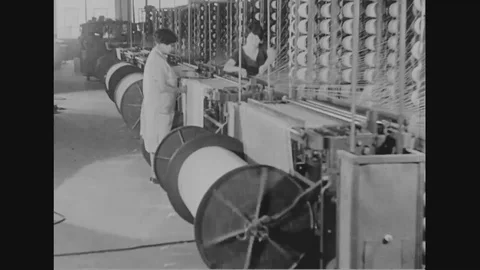 Women warp thread using machinery in the cotton factory - 1930 Stock Footage 99598398