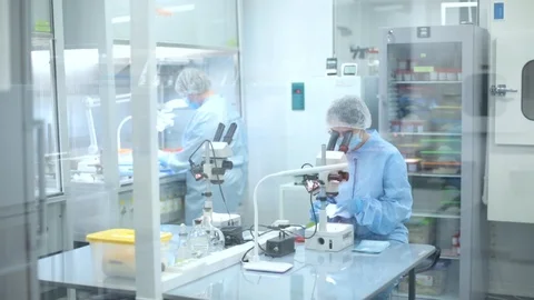 Women work in the lab. Conducts experiments on vaccines. Stock Footage